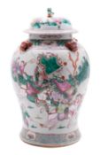 A Chinese famille rose baluster jar and cover with lion dog finial and handles,