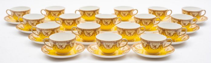A Royal Worcester porcelain tea service, with sepia decoration on a yellow ground,