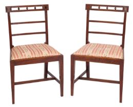 A pair of Regency mahogany side chairs,