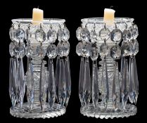 A pair of clear glass table lustres with hobnail cut decoration and hung with prismatic drops, 18.