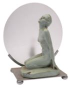 A painted plaster mounted figural table lamp in Art Deco style,