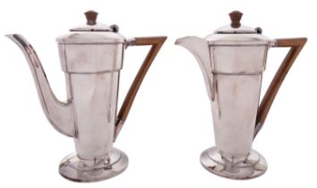 A pair of Art Deco silver plated cafe au lait pots by Walker & Hall, Sheffield circa 1930,