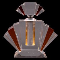 An Art Deco table scent bottle of clear and amber flashed fan-shaped form with chrome mounts, 22.