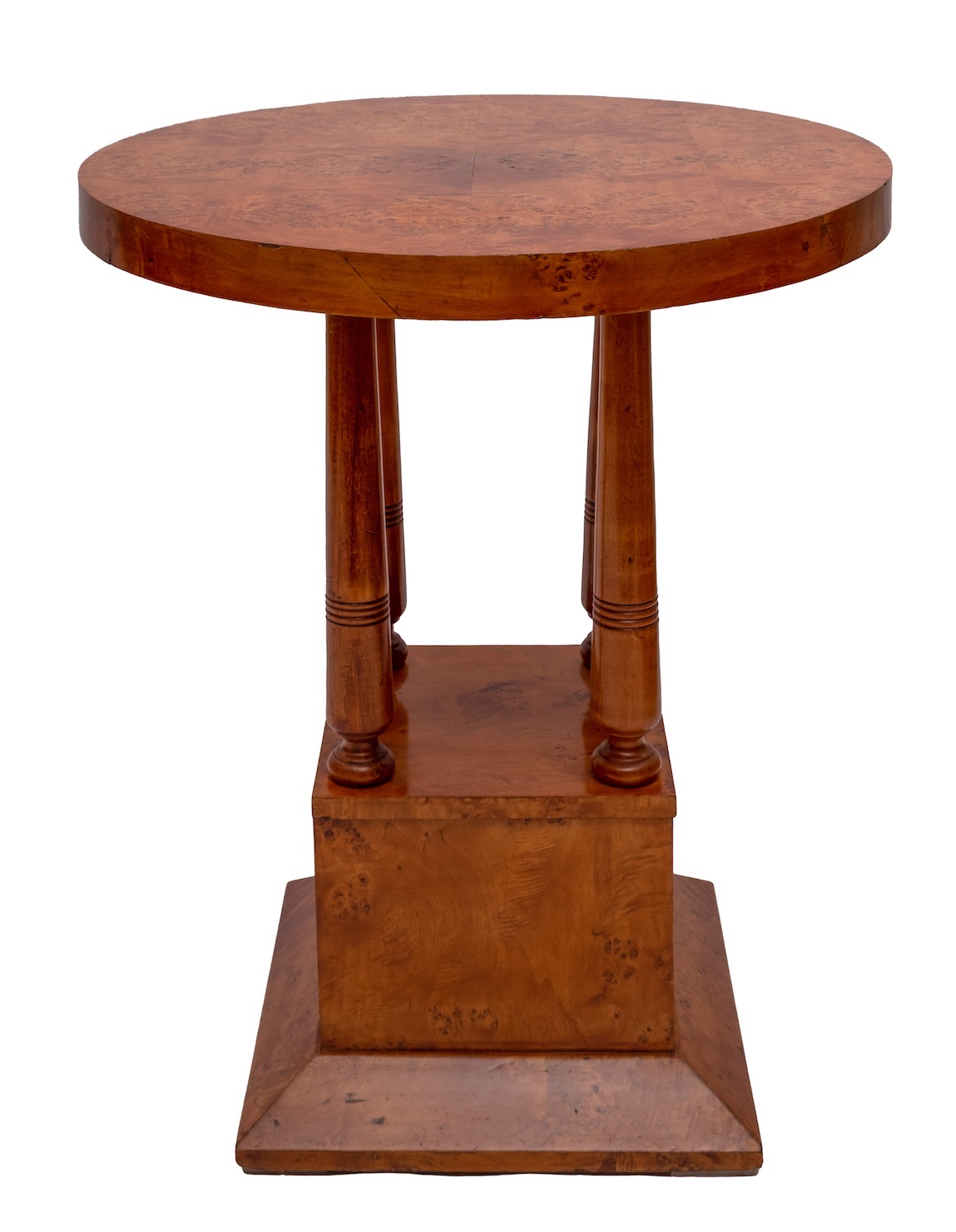 A circular bird's eye maple table, in Art Deco style, of recent manufacture; 76cm high,