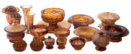 A group of Davidson pressed Amber Cloud glass, comprising four flower bowls, pattern no.