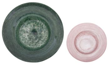 Two Nazeing glass shallow dishes, of circular form one under cloudy green with bubble inclusions,