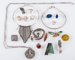 A group of mainly mid-century jewellery including a torque necklace and textured silver ring,