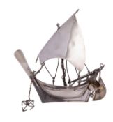 A silver coloured model of a dhow, unmarked, 20th century, probably Gulf States, 12.