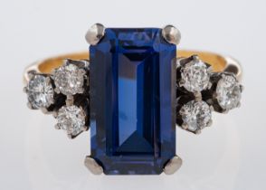 A cocktail ring set with diamond and synthetic sapphire, marks for 18ct gold, diamond,