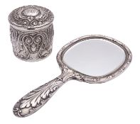 An American silver powder box and a hand mirror by Tiffany & Co.