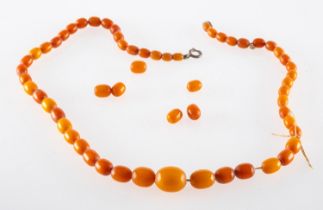 Amber beads, 23 grams, largest bead 15 x 9mm.