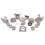 A collection of silver, including: three graduated silver and glass swan dressing table boxes,