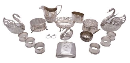 A collection of silver, including: three graduated silver and glass swan dressing table boxes,