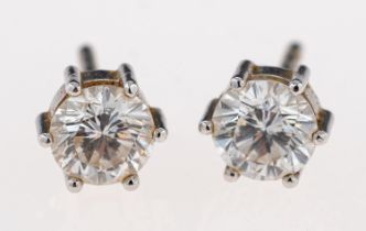 A pair of diamond single stone earrings, the brilliant cut diamonds, estimated to weigh 1.