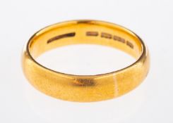 A plain gold wedding band, 22ct, D form size Q, weight 8.