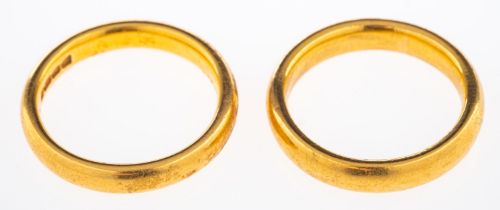 Two 22ct gold wedding D form bands London 1896 and Birmingham 1861, L-M and M sizes, 12.