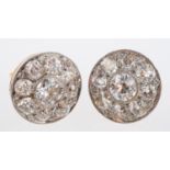 An Edwardian diamond set earrings, set with old cut stones in a millgrain setting,