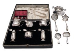 A silver six piece cruet set by Roberts & Dore Ltd, Birmingham 1936, round faceted,