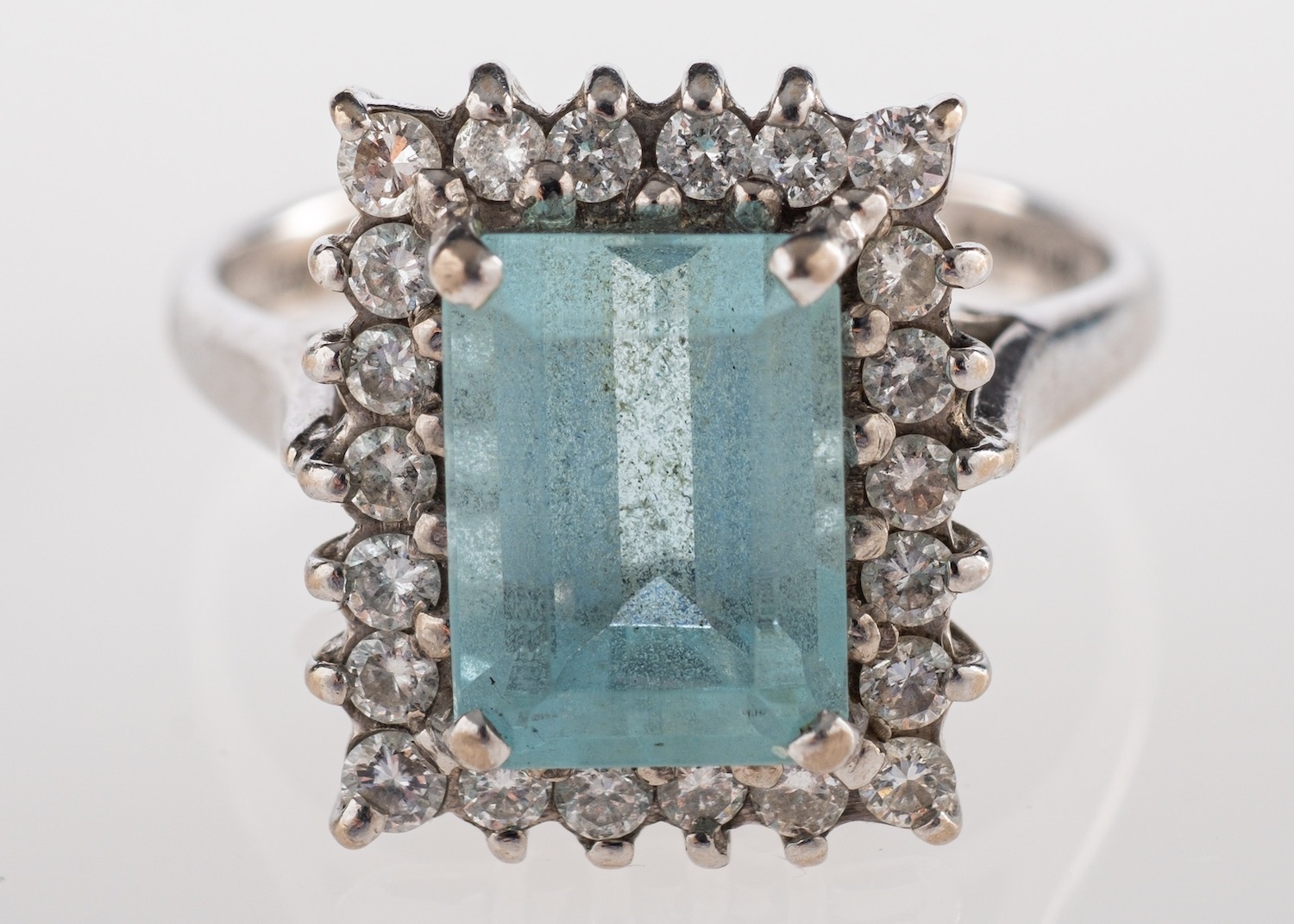 An aquamarine and diamond ring,