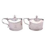 Two similar George III silver mustard pots by William Abdy II, London 1801 and 1810,