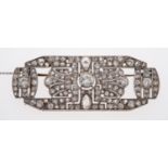 A 1930's diamond set brooch in fine millgrain setting,