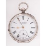 A silver pocket watch the dial having a subsidiary seconds dial and signed for the retailer The