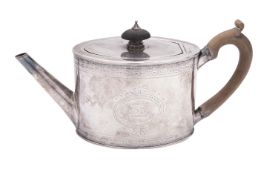 A George III silver tea pot by Robert Hennell I, London 1782, straight-sided oval,