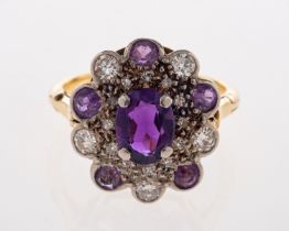 An 18ct gold, Amethyst & diamond cluster ring,