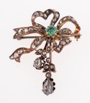 An emerald and diamond brooch,
