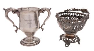 A silver twin handled cup by Charles Edwards, London 1913, ogee baluster in mid 18th century style,