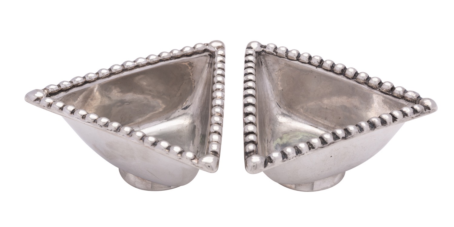 A matched pair of Scottish silver triangular dishes probably by Robert Sawers Ltd,