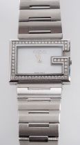 Gucci, a stainless steel and diamond wristwatch, with quartz movement,