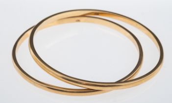 Two plain bangles, marks for 9ct gold, internal measurement 6cm, weight 27.