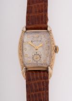 Bulova a gold-plated gentleman's wristwatch the rectangular dial with raised gold Arabic numerals