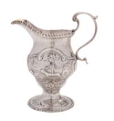 A George III silver cream jug, maker's mark worn (..