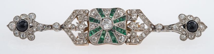 Art Deco brooch set with diamonds, emerald and onyx in fine millgrain setting,