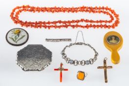 A coral bead necklace, coral cross, another in gilt metal,