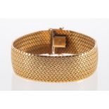 A fine vintage Norwegian gold bracelet of woven flat links with satin finish and bright borders,