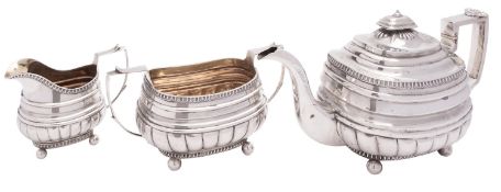 A matched George III English provincial silver three piece tea service by Simon Harris of Plymouth