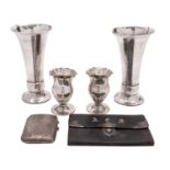 A pair of Arts and Crafts style silver vases by A. E.