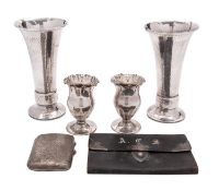 A pair of Arts and Crafts style silver vases by A. E.