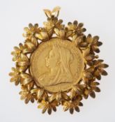 A pendant set with a Victoria gold sovereign coin,