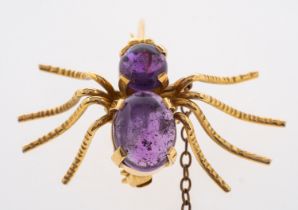 A Spider brooch set with cabouchon amethyst stones,