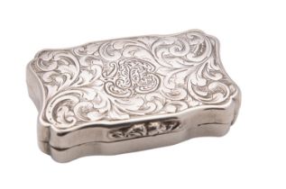 A Victorian silver vinaigrette, Taylor & Perry, Birmingham 1892, shaped rectangular form,