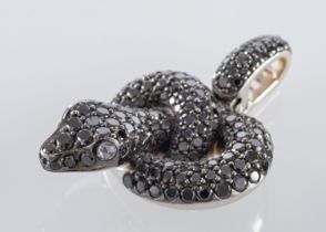 A serpent pendant, set with black diamonds,