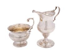 A George III silver cream jug by Charles Hougham, London 1786,