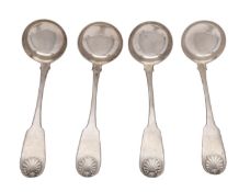 A set of four George IV Sottish provincial silver Fiddle and Shell pattern toddy ladles by Daniel