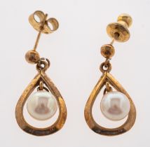 A gold pear form earrings with pearl drop, 9ct Condition Report post fittings,