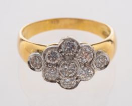 A dress ring set with diamonds in 18ct white and yellow gold, hallmarks for 1991,