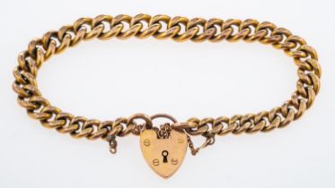 A gold curb link bracelet with heart clasp,9ct,